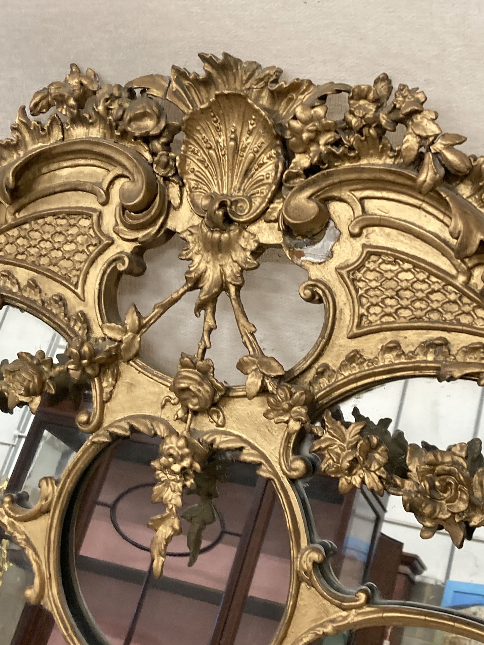 A late Victorian giltwood and gesso overmantel mirror, width 108cm, height 115cm